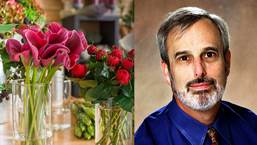 photo of Dr. Herbert Snyder and vases of flowers