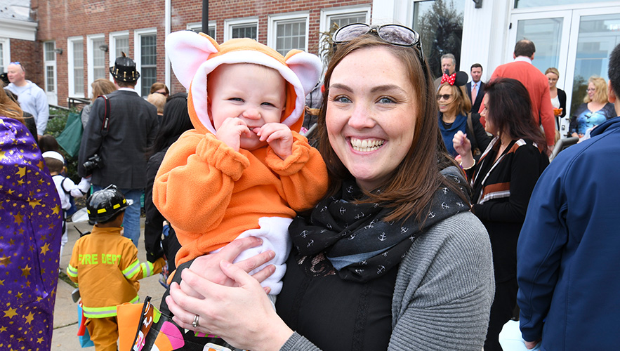 woman with child in Halloween costume