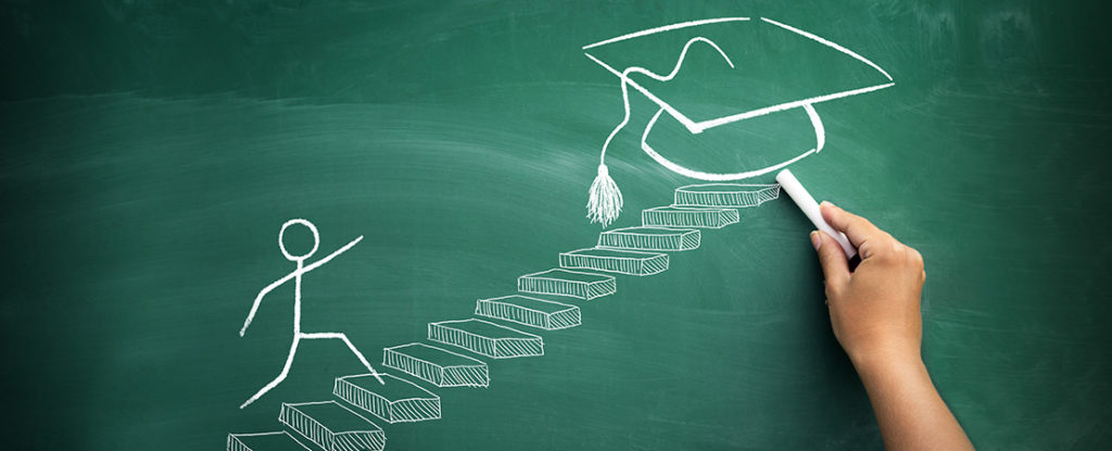 stick figure walking upstairs toward a graduation cap