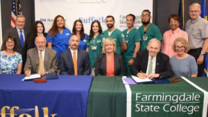 President Nader (front row, 2nd from right) is joined by members of the FSC and SCCC communities