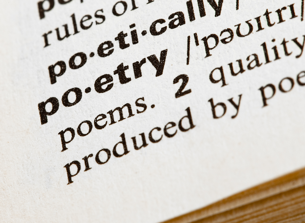 book with word poetry written in it