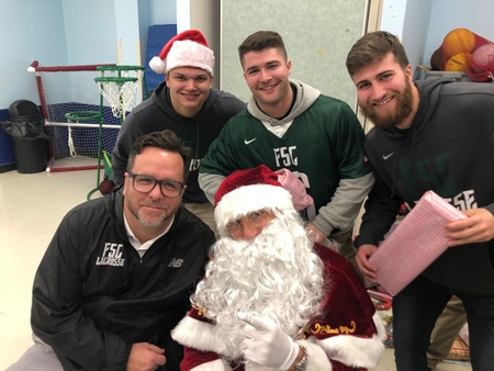 Lacrosse players and Santa