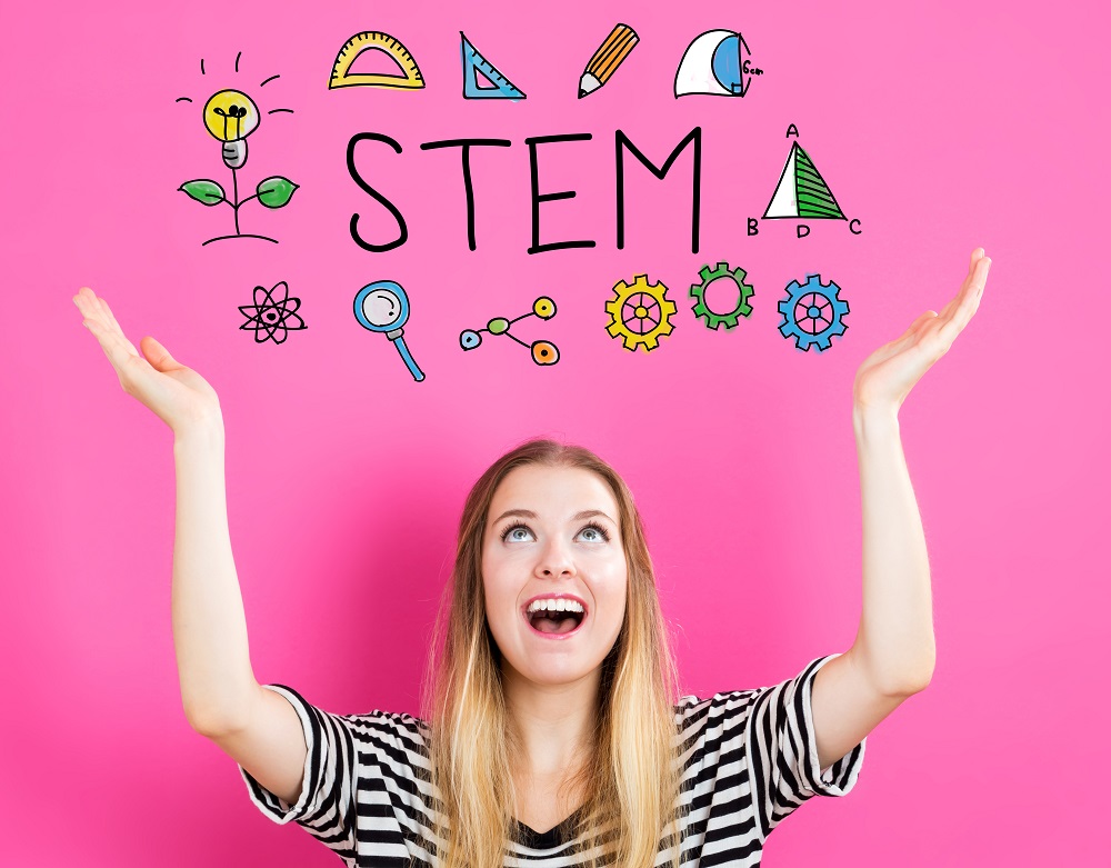 woman holding STEM image