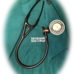 Laboratory coat with stethoscope on top.