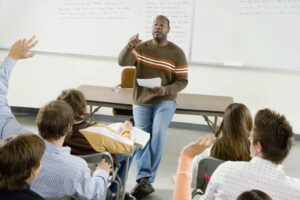 teacher in front of class Trusty